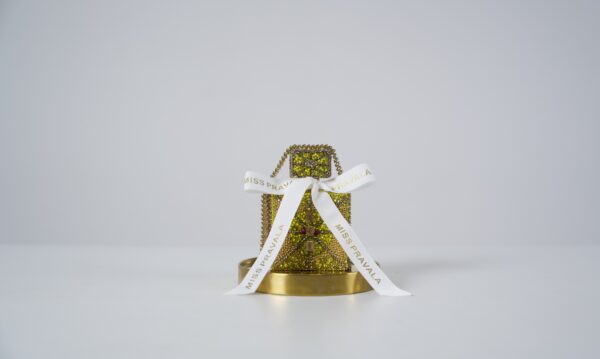 Custom diamond perfume bottle with diamonds, rubies and gold accents